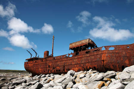 Red rust on old sank boat, shipwreck in Inisheer, Aran Islands, Galway county, Irelandの写真素材