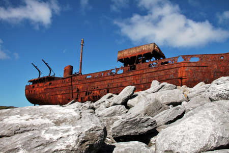 Red rust on old sank boat, shipwreck in Inisheer, Aran Islands, Galway county, Irelandの写真素材
