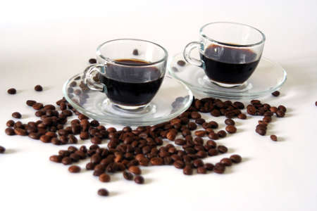 two cups of coffee and coffee beansの写真素材