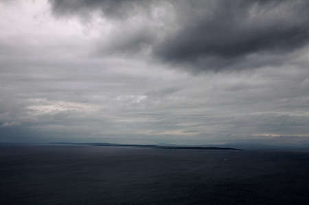 Aran islands viewed from the cliffs of Moher, Irelandの写真素材
