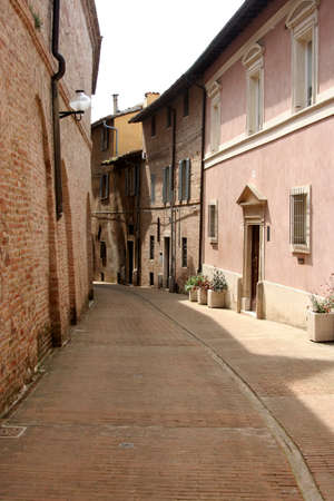 small lane in the historical downtown Urbino, Italyの写真素材