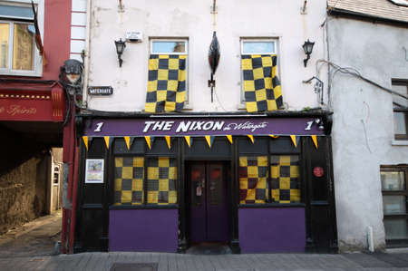 The Nixon Watergate Pub on road in dowtown Kilkennyのeditorial素材