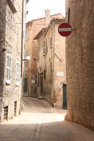 Small road in downtown Urbino, central Italyの写真素材