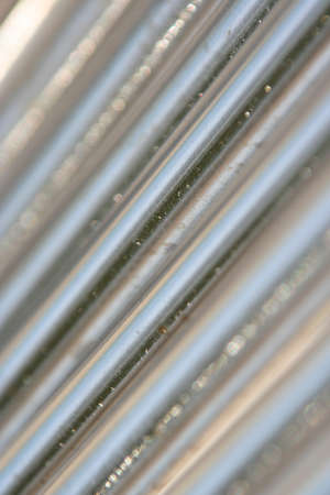 steel pipes gray backgroundの写真素材