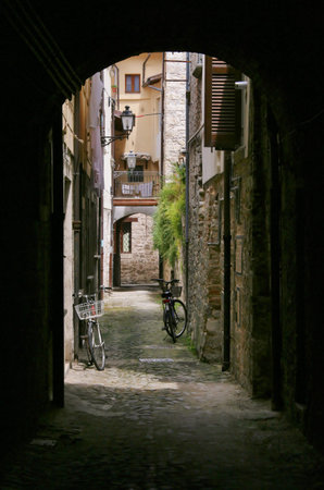 Dark small street in Recanati downtown, Poet Leopardi hometown, Italy