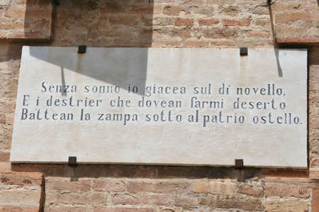 Leopardi's poem on a wall cartel in Recanati, Marche, Italyのeditorial素材