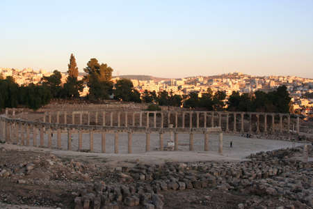 Roman amphitheater in Jerash ruins at sunset, Jordan. Middle East.の写真素材