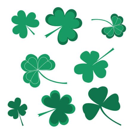 Set of green clover leafs isolated on white background. Vector flat illustration. Elements for decoration.のイラスト素材