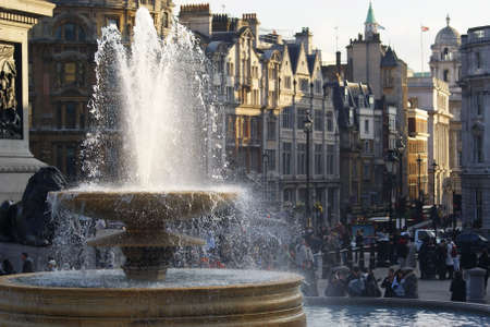 Fountain on Trafalgar Square in Londonの写真素材