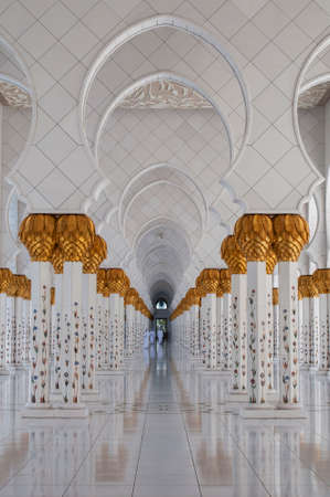 ABU DHABI, UAE - APRIL 17, 2014: Beautiful marble columns of Shiekh Zayed Grand Mosque.のeditorial素材