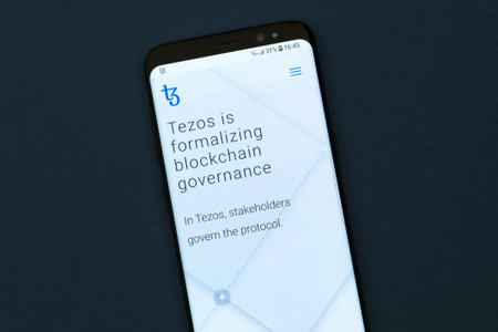 KYRENIA, CYPRUS -SEPTEMBER 12, 2018: Tezos website displayed on the smartphone screen. The world's...
