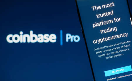 KYRENIA, CYPRUS - OCTOBER 05, 2018: Coinbase Pro website displayed on smartphone screen. Coinbase Pro is a professional trading platform for individuals.のeditorial素材