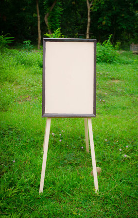 Blank wooden menu board outdoorの写真素材