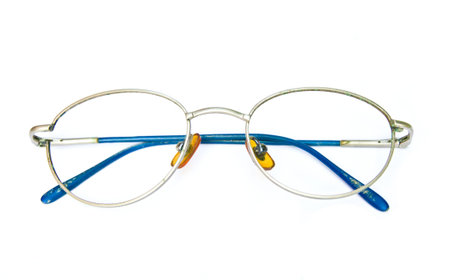 Old glasses on white backgroundの写真素材
