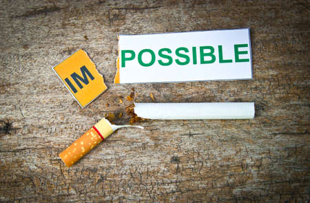 Changing word impossible transformed to possible. Concepts of successfully for
quitting smoking.の写真素材
