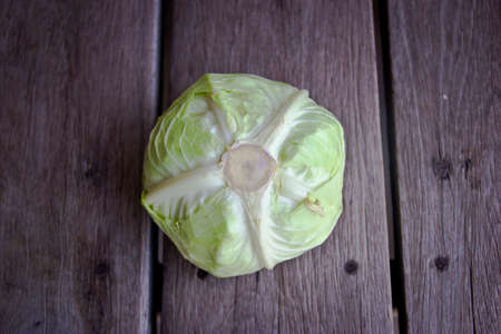 cabbage on wood backgroundの写真素材