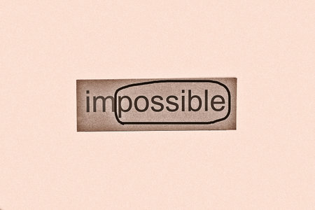 Black and white photo of Marked with ring around possible from impossible. Motivation concept.
