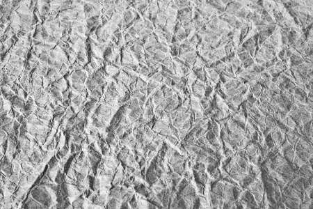Black and white of old blank crumpled paper for background.の写真素材