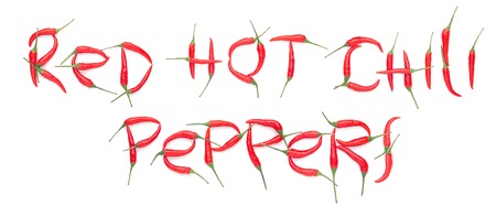 text red  chilli peppers on white background, isolatedの写真素材
