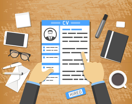 Hands holding CV profile over wooden desk with office objects around, flat design illustrationのイラスト素材