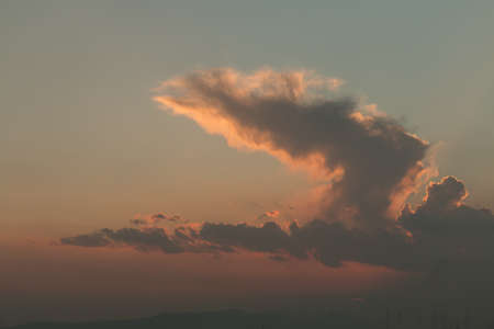 The sun just went below clouds.の写真素材
