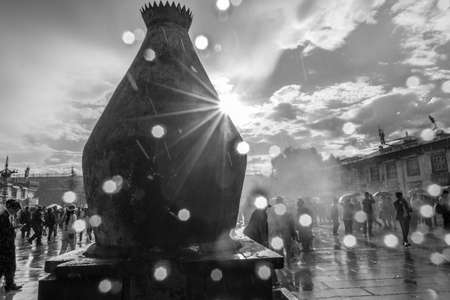 A big burner located on The Jokhang Temple square in a rainy day,in Lhasa,China.のeditorial素材