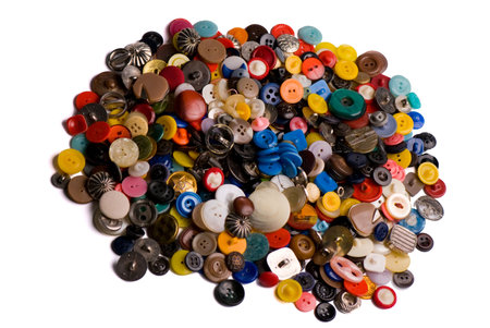 Pile of colorful buttons isolated on white background