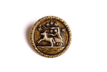 Macro shot of small button isolated on whiteの写真素材