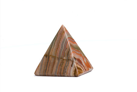 Stone pyromid isolated on white backgroundの写真素材