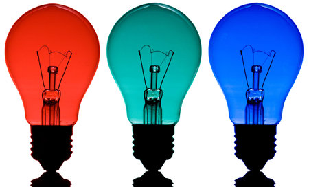 Group of three (red, green and blue) incandesent lamps isolated on white backgroundの写真素材