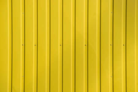 Yellow fence wall abstract backgroundの写真素材