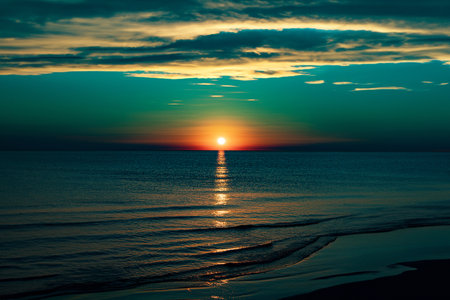 Beautiful sunset over the sea. Sunset over the sea. Toned.の写真素材