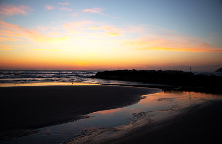 Beautiful sunset on the beach at Khao Lak, Thailand.の写真素材