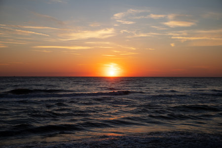 Sunset over the sea. Beautiful sunrise over the sea. Sunset over the sea.の写真素材
