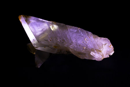 close up of a sample of natural mineral from geological collection - semi precious stone gypsum crystals on black backgroundの写真素材