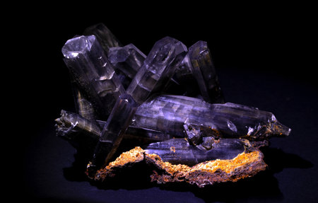 close up of a sample of natural mineral from geological collection - semi precious stone gypsum crystals on black backgroundの写真素材