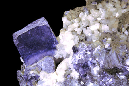 macro shooting of natural mineral from geological collection - raw tourmaline on black backgroundの写真素材