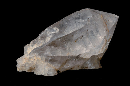 macro shooting of natural mineral rock specimen - rough quartz stone on black backgroundの写真素材