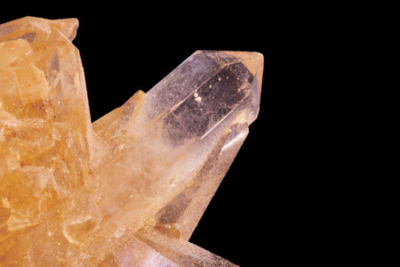 macro shooting of natural mineral rock specimen - raw quartz crystal on black backgroundの写真素材