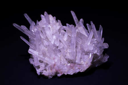 macro shooting of natural mineral rock specimen - matrix of quartz crystals on black backgroundの写真素材