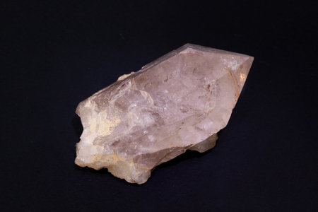 macro shooting of natural mineral from geological collection - rough quartz on black backgroundの写真素材