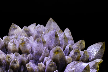 Amethyst crystals on a black background. Macros. Studio shot.の写真素材