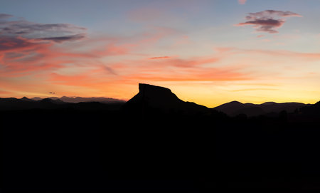 Sunset in the mountains. The breathtaking beauty of the Tuscan-Emilian Apennines with the Bismantova rock in the distanceの写真素材