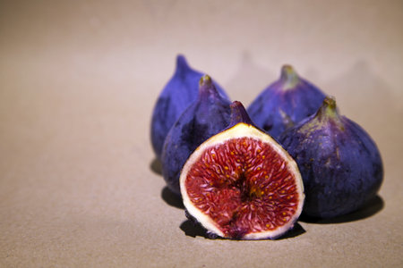 Ripe figs on a brown background. Selective focus.の写真素材