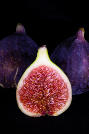 Fresh figs on a black background. Close-up. Studio photography.の写真素材