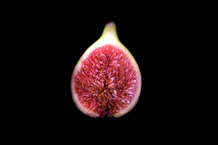 Fresh figs on a black background, close-up, macroの写真素材