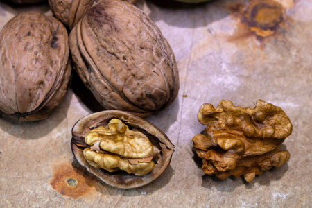 Walnuts on a wooden background. Close-up. Selective focus.の写真素材