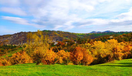 Colorful autumn landscape in the mountains. View from the hillside.の写真素材
