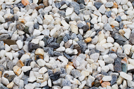 white and gray pebble stones background, closeup of photoの写真素材