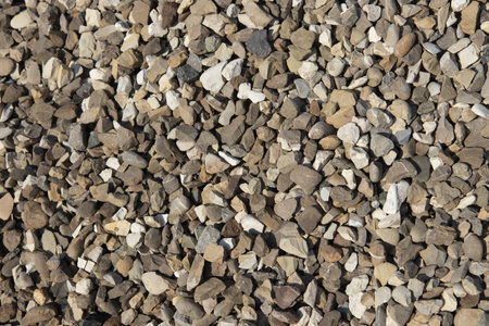 Gravel background, pebble stones texture, stone background.の写真素材